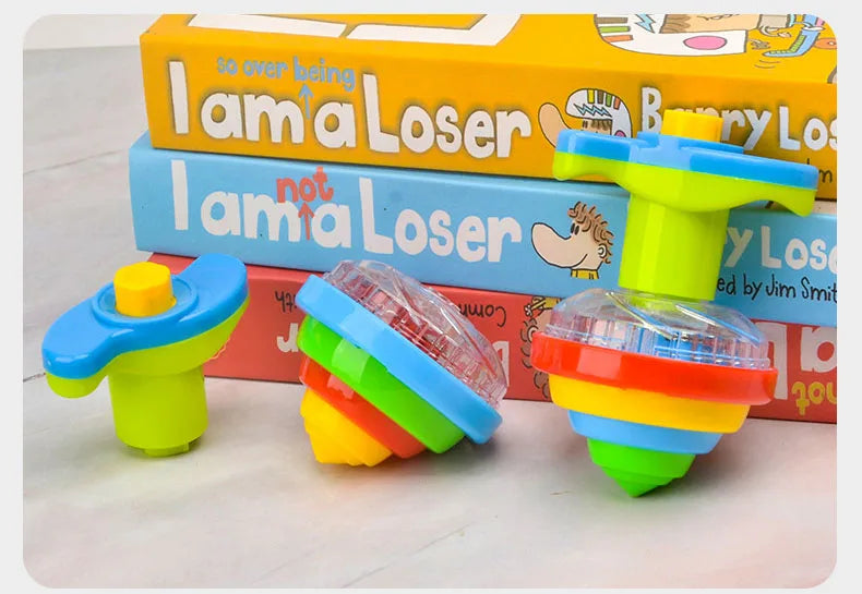 UFO Kreisel mit LED-Licht und Musik für Kinder – Einfacher Launcher, bunte Rotation, Party- und Geburtstagsgeschenk